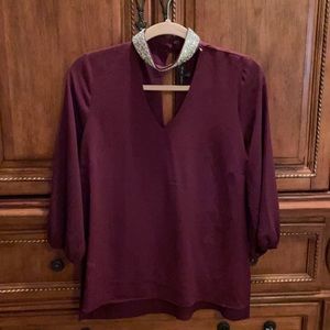 Loose fitting maroon blouse with glitter built in choker